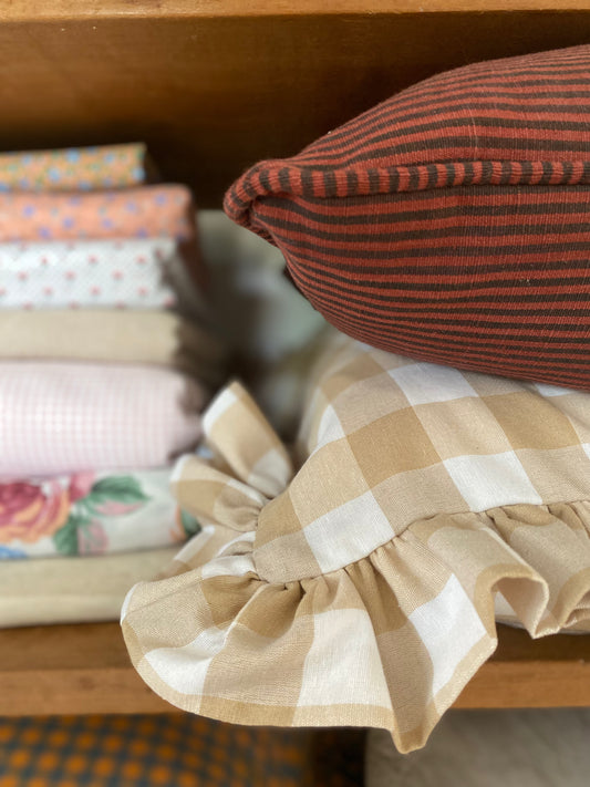 Funda cojín rayas burdeo