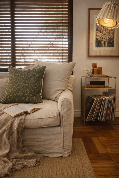 Cojín floral verde con pipping